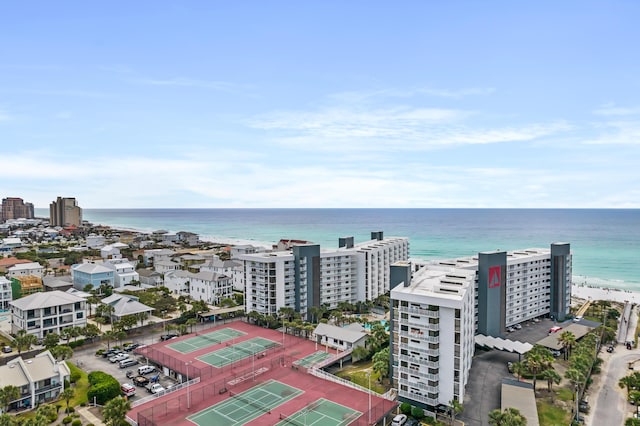 bird's eye view with a water view and a view of the beach