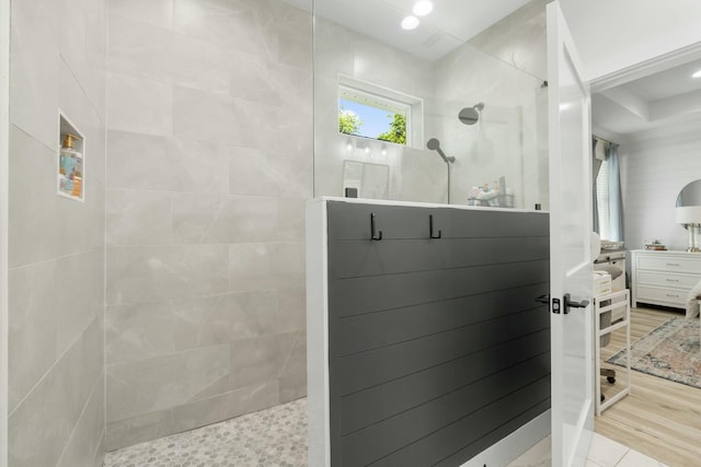 bathroom with a tile shower