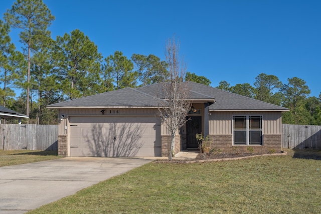 ranch-style house with a front lawn and a garage