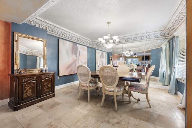 dining area with a chandelier and ornamental molding