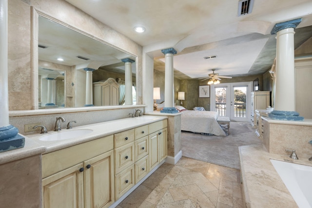 bathroom with french doors, vanity, decorative columns, and ceiling fan