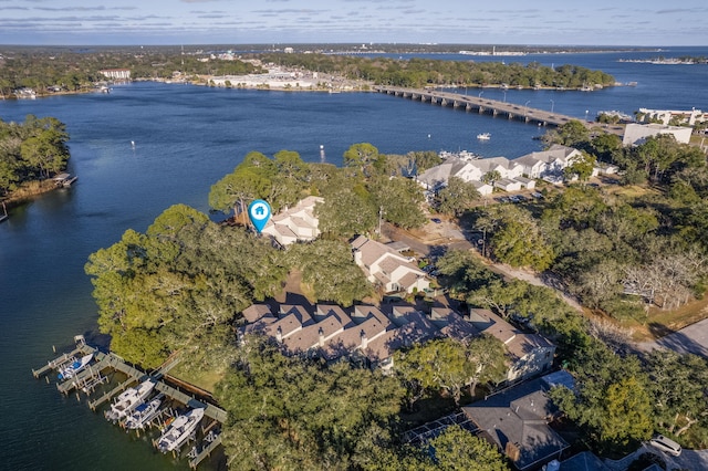 birds eye view of property featuring a water view