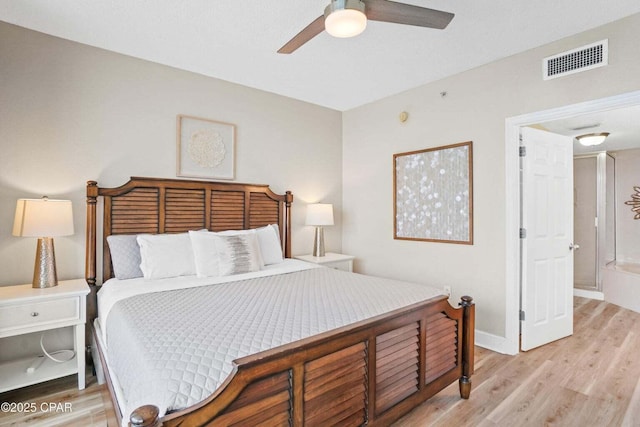 bedroom featuring light wood-type flooring and ceiling fan