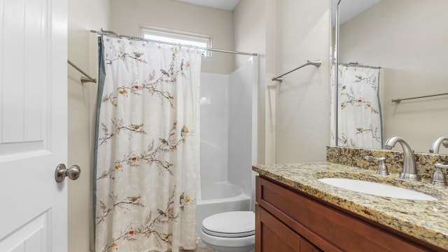 full bathroom featuring vanity, toilet, and shower / bath combo with shower curtain