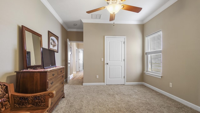 interior space featuring ceiling fan and ornamental molding