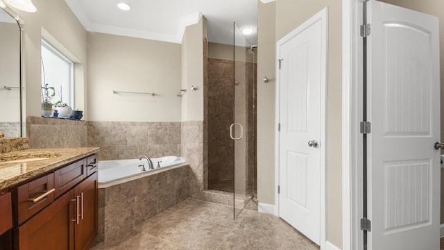 bathroom featuring tile patterned flooring, vanity, separate shower and tub, and ornamental molding