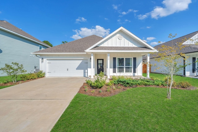 view of front facade featuring a garage and a front lawn