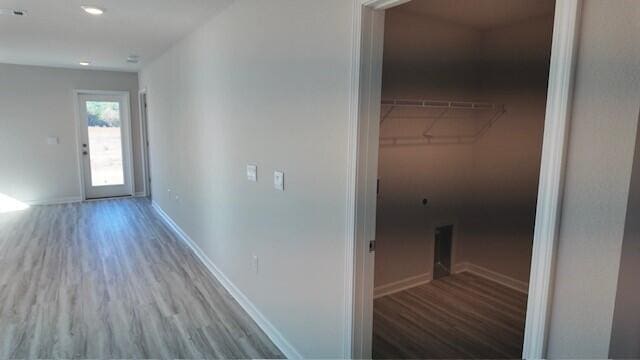 hallway featuring hardwood / wood-style floors