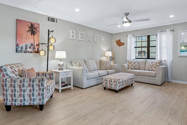 living room with ceiling fan and light wood-type flooring