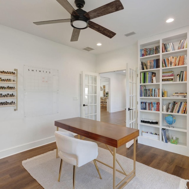 office area featuring ceiling fan, dark hardwood / wood-style flooring, and french doors