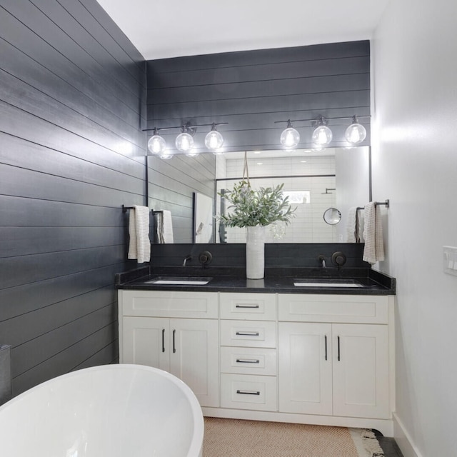 bathroom featuring wooden walls and a bath