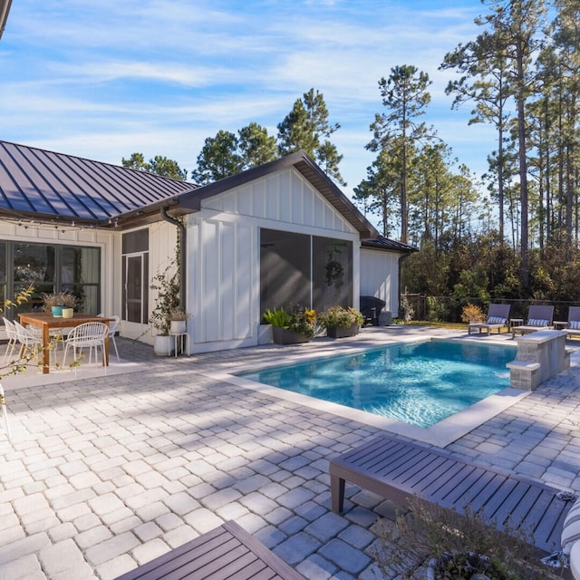 view of pool with a patio