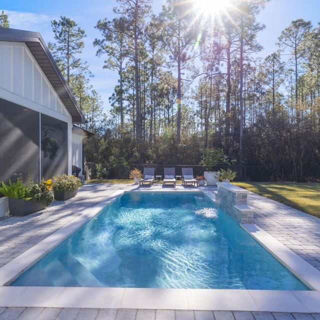 view of pool with a patio area