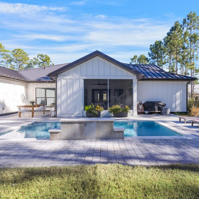 back of house with a patio and ceiling fan