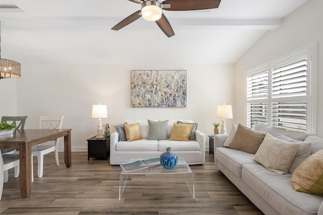 living room with wood-type flooring, vaulted ceiling with beams, and ceiling fan with notable chandelier