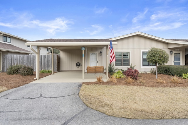 view of front of home with a carport