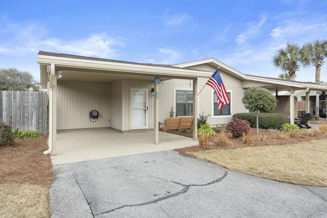 view of front of house featuring a carport