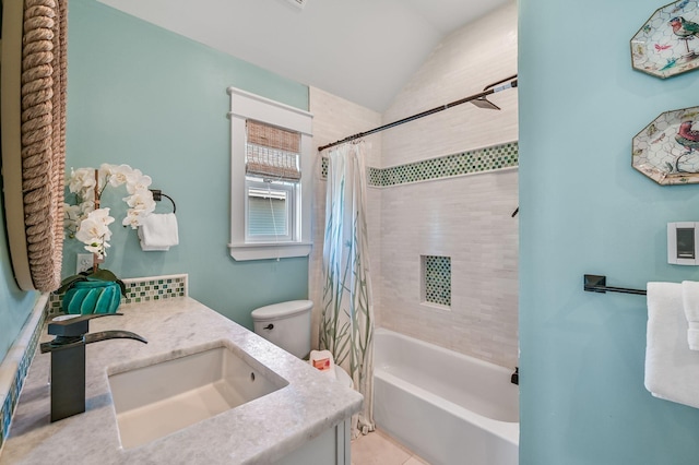 full bathroom featuring vanity, toilet, shower / bathtub combination with curtain, and lofted ceiling