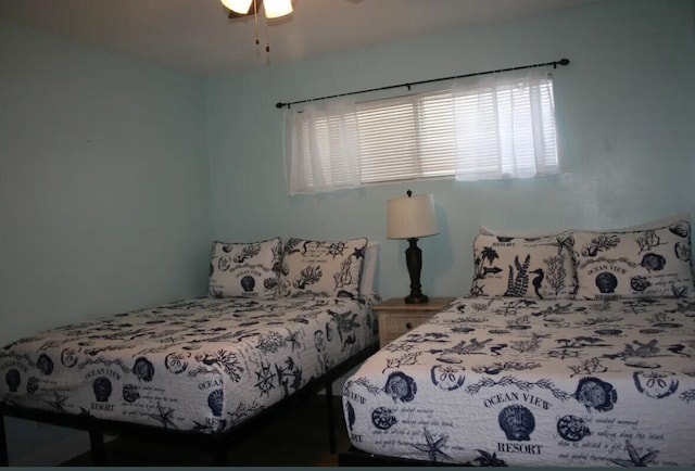 bedroom featuring ceiling fan