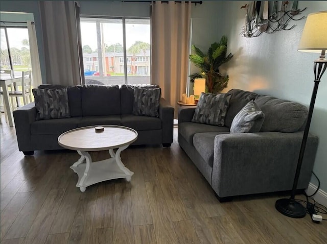 living room with dark wood-type flooring