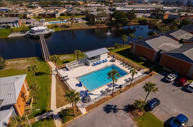 birds eye view of property featuring a water view