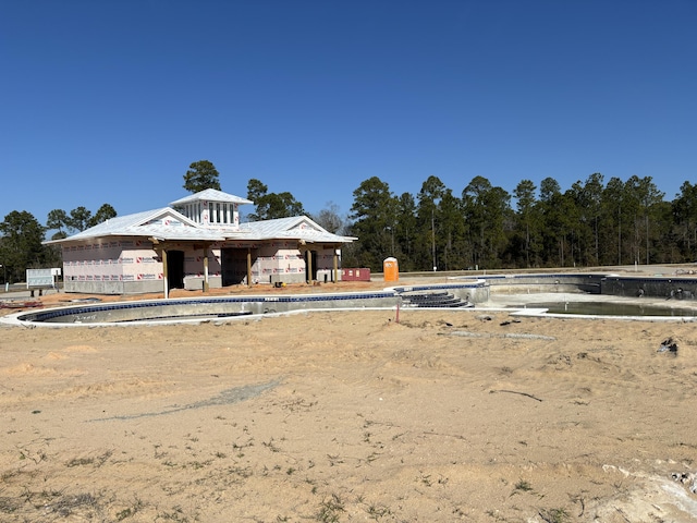 363 Bear Creek Blvd, Freeport, FL 32439 - view of front of house with metal roof