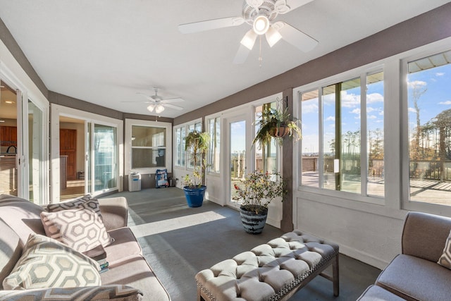 sunroom / solarium with ceiling fan