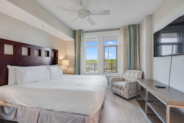 bedroom featuring ceiling fan and light hardwood / wood-style flooring