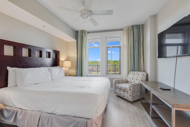 bedroom featuring light hardwood / wood-style floors and ceiling fan