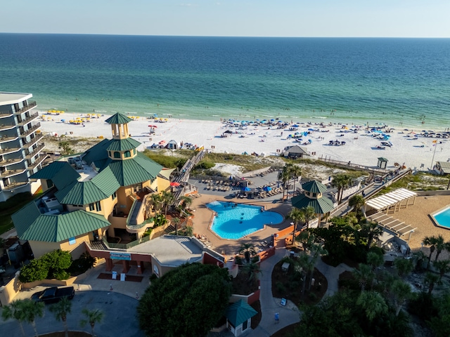 bird's eye view featuring a view of the beach and a water view