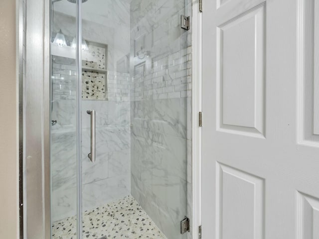 bathroom with an enclosed shower