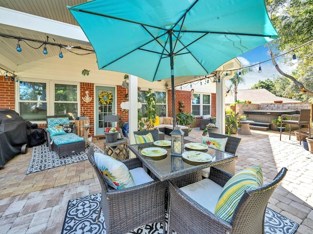 view of patio featuring a grill and an outdoor living space