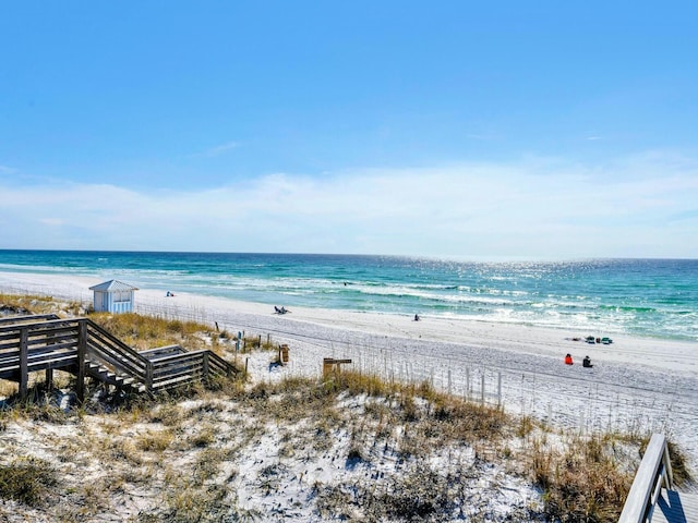 view of water feature with a beach view