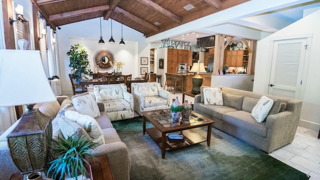 tiled living room with vaulted ceiling with beams and wooden ceiling