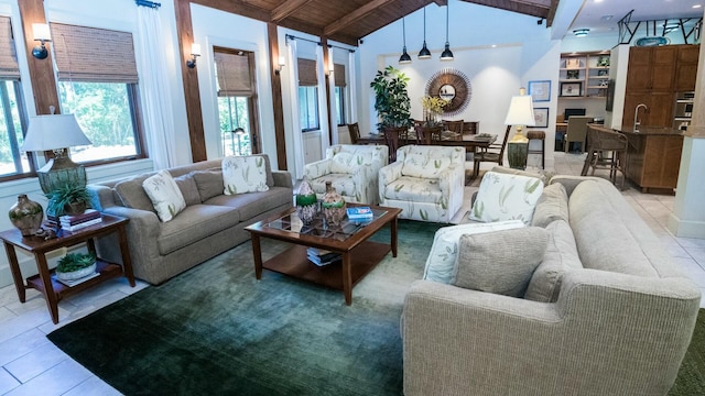 tiled living room featuring lofted ceiling with beams and wooden ceiling