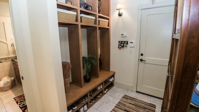 mudroom featuring light tile patterned floors