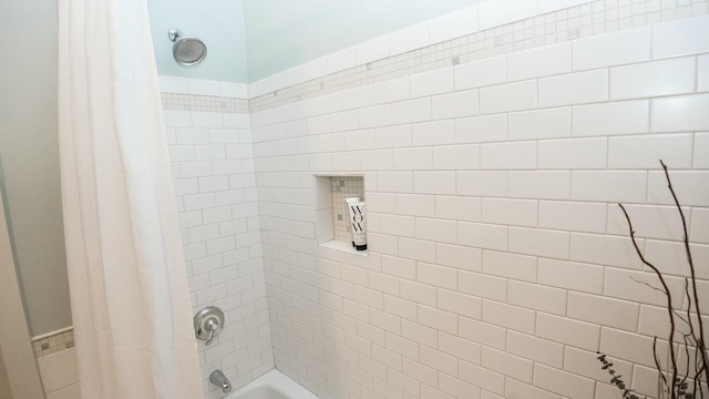 bathroom featuring shower / bath combination with curtain