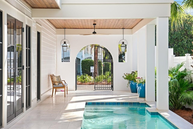 exterior space with a fenced in pool