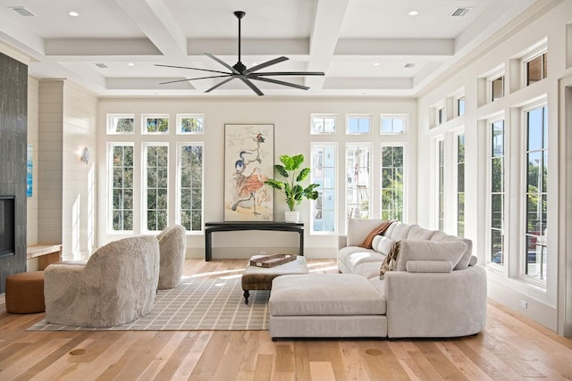 29 Thyme St, Santa Rosa Beach, FL 32459 - living room with light wood-style flooring, coffered ceiling, a ceiling fan, beamed ceiling, and a fireplace