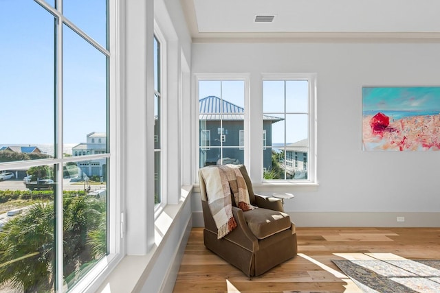 sitting room with light hardwood / wood-style floors