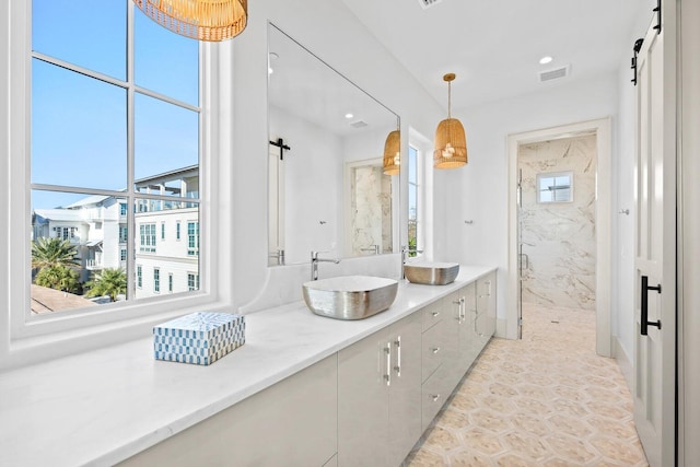 29 Thyme St, Santa Rosa Beach, FL 32459 - full bathroom with vanity, a marble finish shower, recessed lighting, and tile patterned flooring
