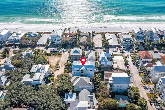 bird's eye view with a beach view and a water view