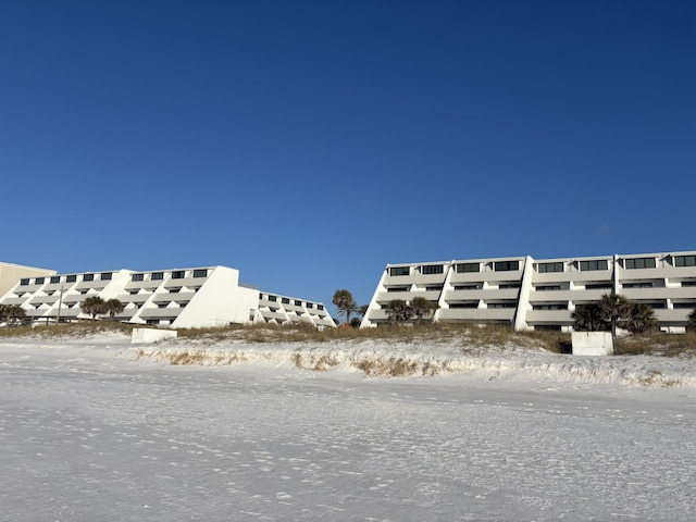 view of snow covered property