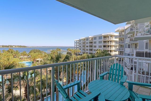 balcony featuring a water view