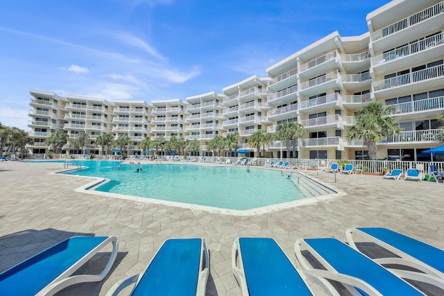 view of swimming pool featuring a patio