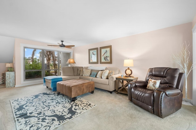 living room with ceiling fan and light colored carpet