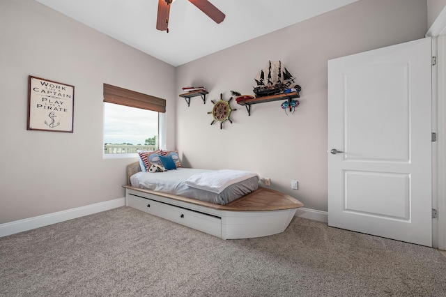 bedroom with light colored carpet and ceiling fan