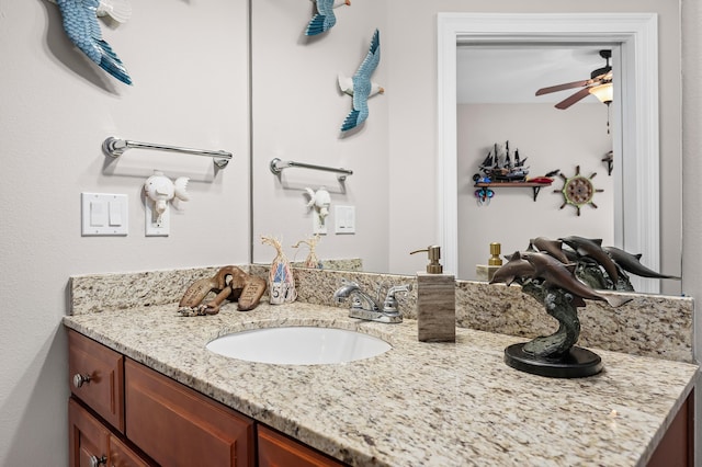 bathroom featuring vanity and ceiling fan