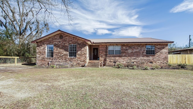 ranch-style house with a front yard