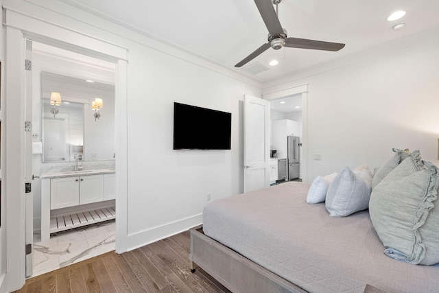 bedroom featuring ornamental molding, ceiling fan, sink, connected bathroom, and dark hardwood / wood-style floors